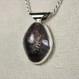 Silver Pendant With Hematite Included Quartz
